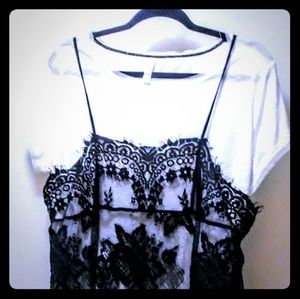 Xhilaration trendy black lace camo over white tee.